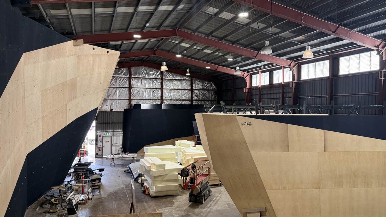 View of rope and bouldering walls from mezzanine